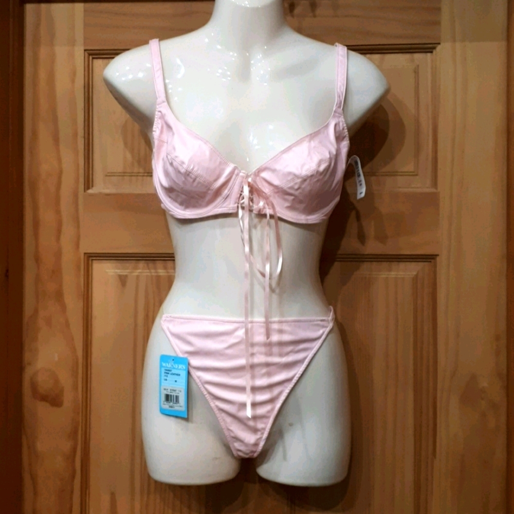 Pink leather bra and g-string set.